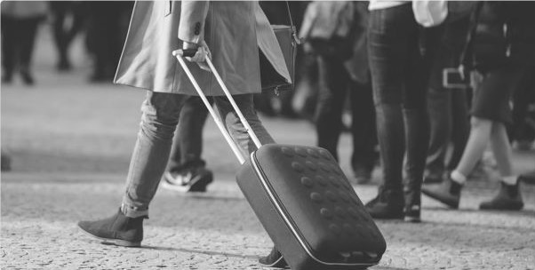 Traveler with suitcase